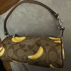 Coach Nolita Barrel Bag in Signature Canvas with Banana Print